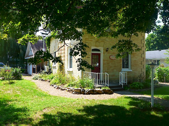 Red Doors on Green exterior